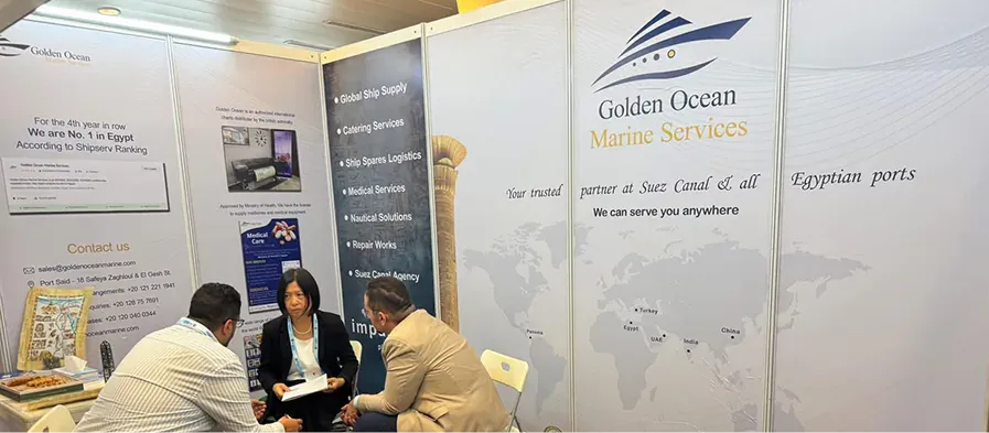 Visitors meeting the Golden Ocean team at an exhibition booth