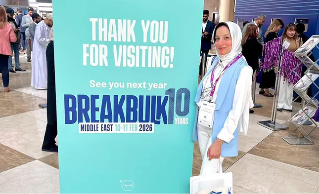 Golden Ocean representatives beside a Breakbulk Europe welcome display